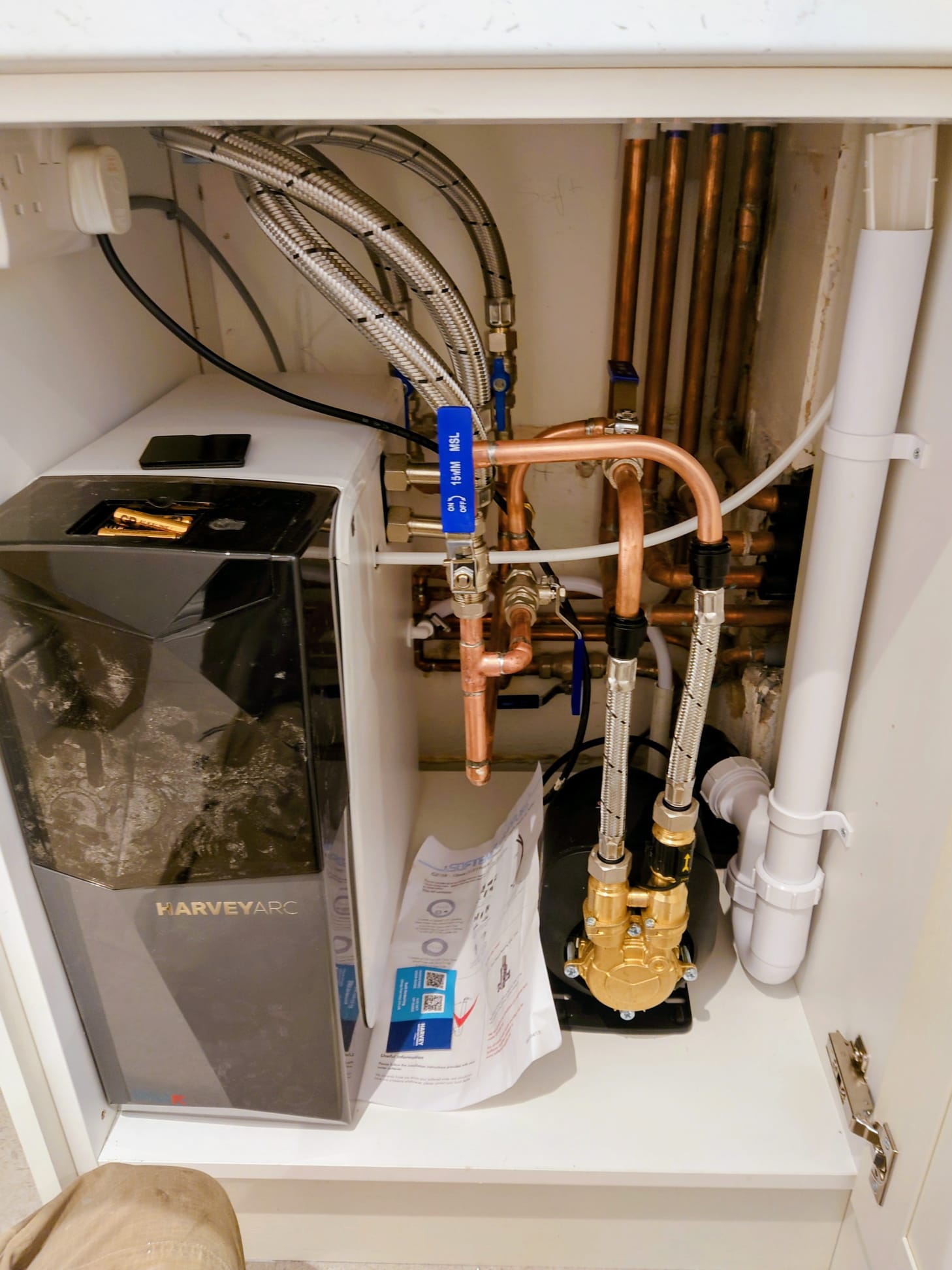 Under-sink copper plumbing and water softener installation